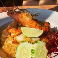 Tom Yum Fried Rice With Jumbo Prawns · Recommended, Spicy. Stir-fried rice with the famous Thai Tom Yum paste, shrimps, scallions, ...