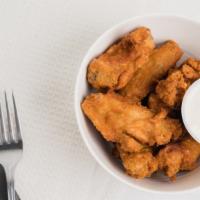 Buffalo Wings (8 Pcs.) · served mild or hot.