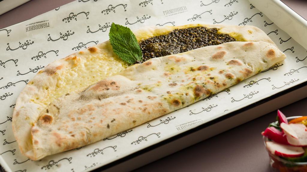 Za'Atar · A special blend of thyme, sumac, and sesame seeds baked on our flatbread. Vegan.