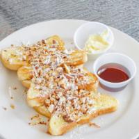 French Toast (3) · 3 Delicious slices of French toast with powdered sugar and syrup and butter yummy!