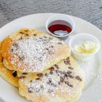 Chocolate Chip Pancakes · 3 Delicious buttermilk pancakes sprinkled with chocolate chips and powdered sugar . They com...