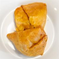 Vegetable Samosa (2 Pieces) · Most popular. Green peas and potatoes wrapped in a crispy patty.