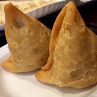 Chicken Samosa (2 Pieces) · Minced chicken wrapped in a crispy patty.
