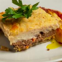 Moussaka · ground beef, potatoes, eggplant casserole topped with béchamel