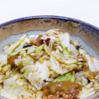 Stir Fried Cabbage W. Soy Sauce · Mild Spicy. Served with meat.