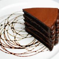 Death By Chocolate Cake · Sinfully decadent seven layer chocolate cake lavished with rich chocolate butter cream