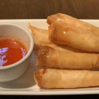 Shrimp Roll · Whole shrimp in an egg roll with honey chili sauce.