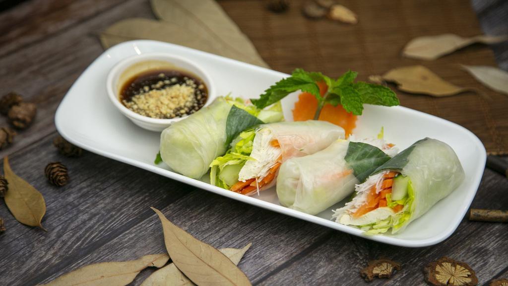 Veggie Fresh Roll · Rice paper wrap, lettuce, mint, Thai basil, cucumber, carrot and tofu. Honey-chili dipping sauce.