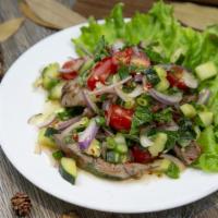 Grilled Beef Salad · Cucumber, cherry tomato, Thai chili, garlic, lime juice, fish sauce, red onion, palm sugar, ...