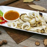 Calamari · Served with a spicy Southern-style green garlic chili sauce.