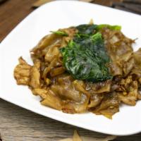 Pad See-Ew (Black Noodles) · Sautéed rice noodles in a browned soy sauce with egg, Chinese broccoli and your choice of me...