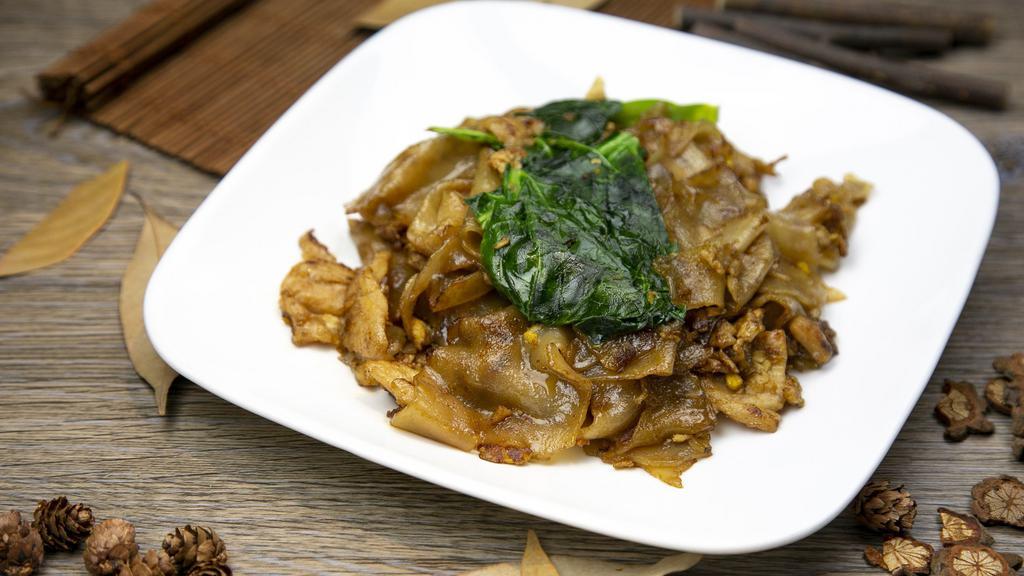 Pad See-Ew (Black Noodles) · Sautéed rice noodles in a browned soy sauce with egg, Chinese broccoli and your choice of meat or tofu.