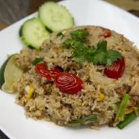 Nora Thai Fried Rice · Meat, egg, tomato, onion, and scallion.