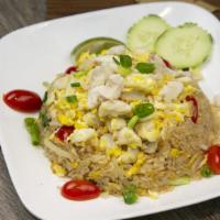 Crab Fried Rice · Lump crab meat, egg, cherry tomato, onion and scallion.