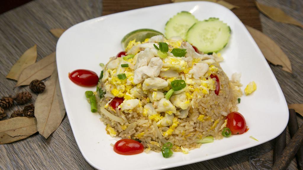 Crab Fried Rice · Lump crab meat, egg, cherry tomato, onion and scallion.
