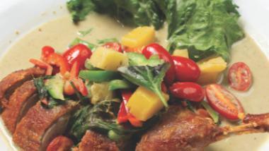 Duck Curry · Red curry with pineapple, cherry tomato, Thai basil.