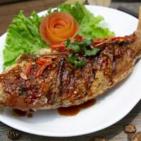 Tamarind Whole Fish · Crispy red snapper, signature tamarind glaze.