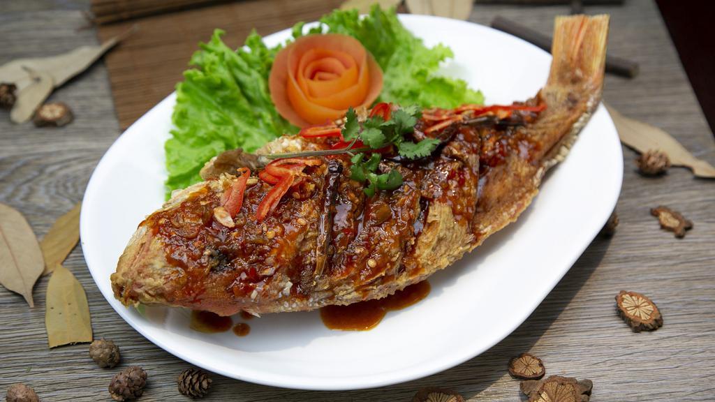 Tamarind Whole Fish · Crispy red snapper, signature tamarind glaze.