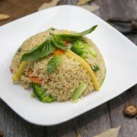 Vegan Vegetable Fried Rice · Baby corn, broccoli, Napa cabbage, carrots and scallion.