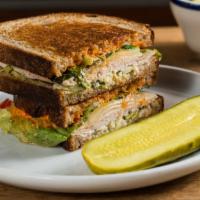 Smoked Turkey Sandwich · Green olive, manchego, calabrian chili