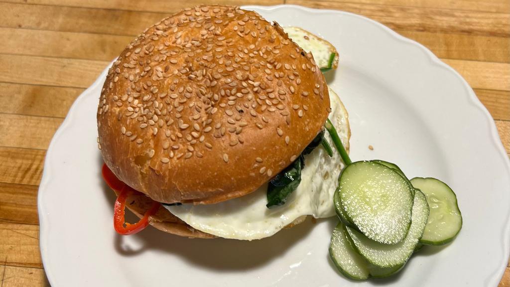 Egg Sandwich · smoked cheddar, baby spinach, fresno chili, aioli
