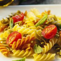 Tri Color Fusilli Pasta · Fresh cooked tri color lengthy pasta made to customer's customization!
