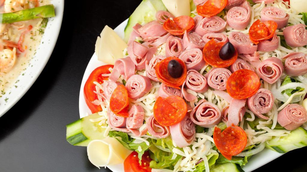 Antipasto Salad · Fresh Spring Mix, Fresh Mozzarella, Pepperoni, Black Olives, Onion, Cherry Tomatoes and Cucumber with Balsamic Dressing.
