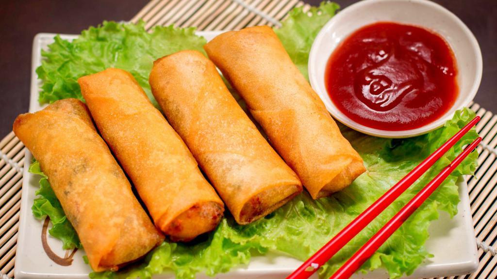 Harumaki (Vegetable Spring Roll) · Four pieces of fresh made vegetable spring rolls.