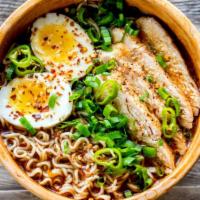 Chicken Ramen · Rich savory pork broth, fresh chicken, fish cakes, bamboo shoots, and a soft egg on a bed of...