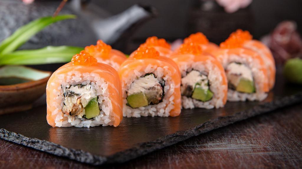 Salmon & Avocado Roll · Salmon and avocado with seaweed wrapped in rice.