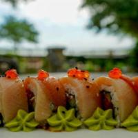 Yellowtail Scallion Roll · Yellowtail scallion and seaweed wrapped in rice.