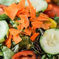 House Salad (Vegan) · iceberg lettuce, carrots, tomato, cucumbers, olives, and pepperoncini served with our house ...