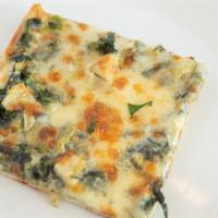 Spinach Artichoke · Grandma pie with spinach & artichokes in a cream sauce topped with mozzarella cheese.