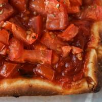 Marinara Pizza · Chopped tomatoes, chopped garlic, salt, pepper, and oregano, baked on our sicilian crust.
