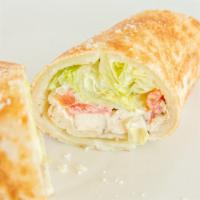 Grilled Chicken Caesar Wrap · on our homemade flatbread