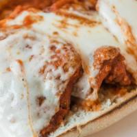 Shrimp Parmigiana · Breaded and fried topped with tomato sauce and mozzarella.