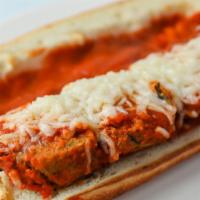Vegan Meatball Parm Hero · Our homemade meatless meatballs on our homemade Italian bread with Daiya vegan cheese and to...