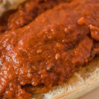 Veal Cutlet Milanese · Deep fried veal cutlet smothered with tomato sauce.