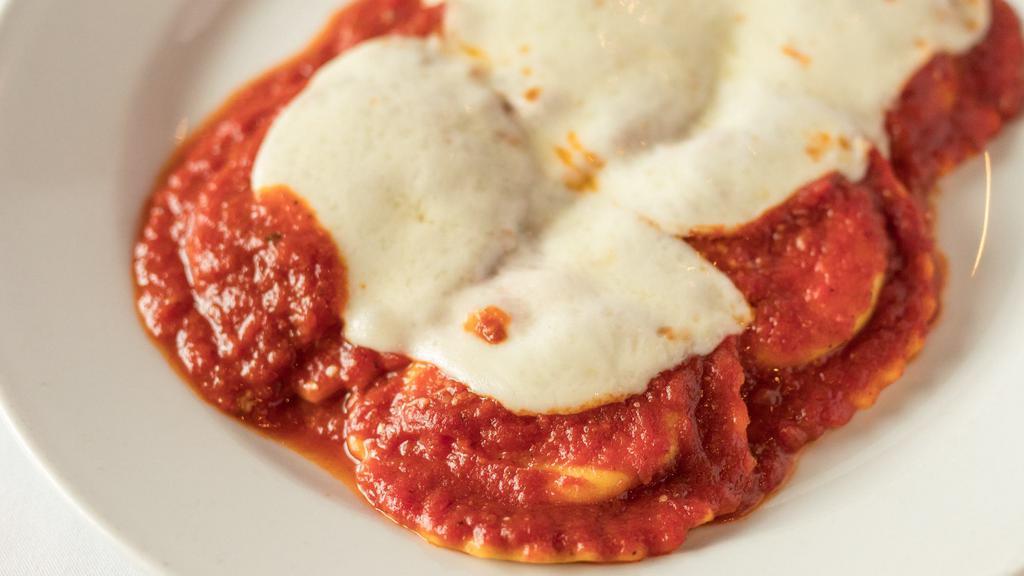 Baked Cheese Ravioli (5) · Ravioli sautéed in a tomato sauce and topped with mozzarella.