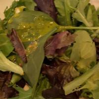 Local Greens  Salad · charred corn, shaved radish and spring onion, cherry tomatoes, toasted quinoa, basil vinaigr...