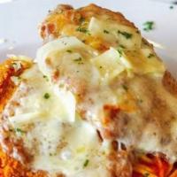 Chicken Parmesan · Crispy chicken cutlets, fresh mozzarella, marinara, spaghetti.