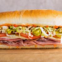 Italian Hero · Salami, pepperoni, ham, provolone cheese, l&t oil and vinegar, Italian dressing.