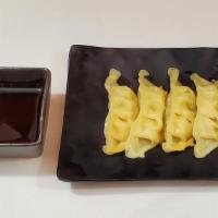 Gyoza · Steamed or pan-fried Japanese pork or vegetable dumplings with house made sweet and sour soy...