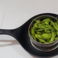 Edamame · Vegan. Steamed green fruit soybeans in the pod, and seasoned with sea salt.
