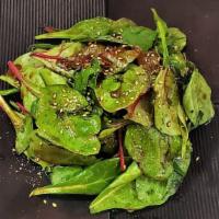 Green Salad · Vegetarian. Mixed young greens with soy sauce vinaigrette dressing.
