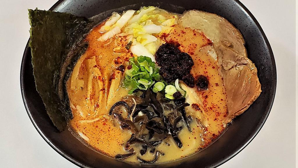 Spicy Miso Ramen · Spicy. Miso based pork broth with spicy sauce on top.