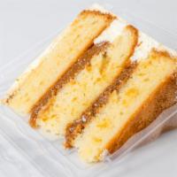 8'' Dulce De Leche Cake · Vanilla cake with dulce de leche filling.