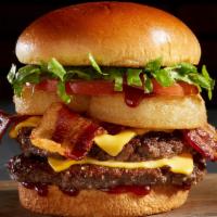 Bbq Bacon Tribeca Burger · 1/2 Lb Angus Beef Patty, BBQ Sauce, Ranch, Cheese, Bacon, Onion Rings, Lettuce and Tomato. C...
