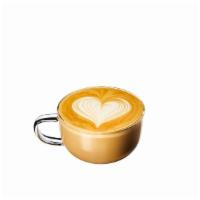 Cappuccino · Milk over espresso with a thick layer of microfoam.