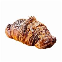 Almond Croissant · Almond cream inside of flaky hand-rolled dough.